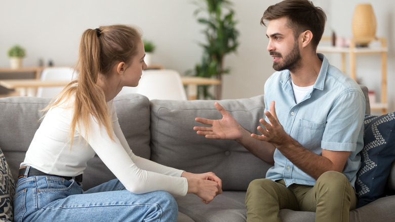 Couple engaging in intense conversation