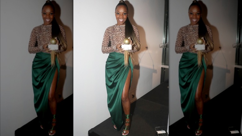 Woman wearing satin skirt