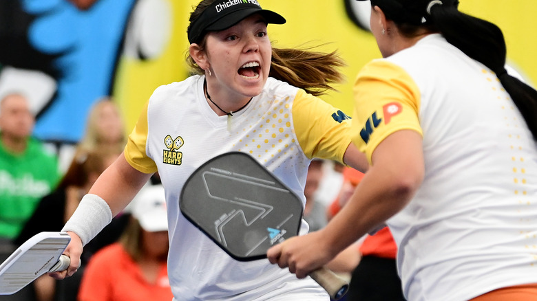 Two women playing team pickleball