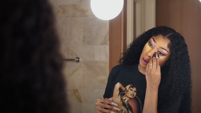 Meghan Thee Stallion doing makeup