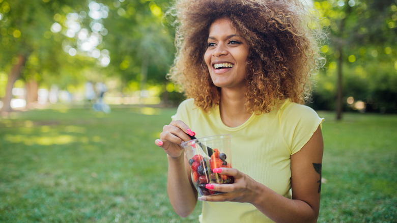 Woman eating outside