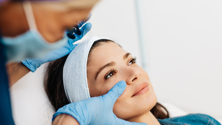 A woman preparing to get filler