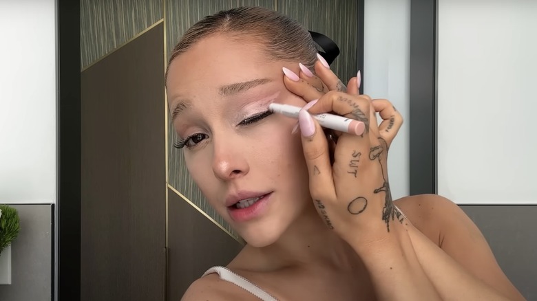 Ariana Grande explaining the base step