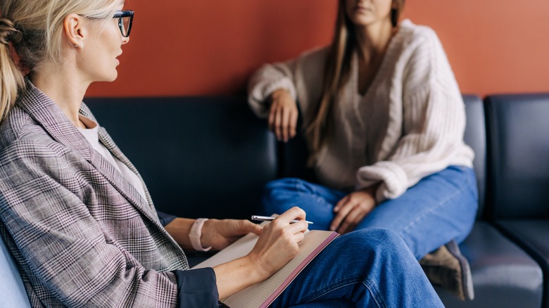 Two women talking in an office