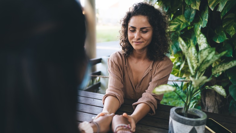 best friends holding hands
