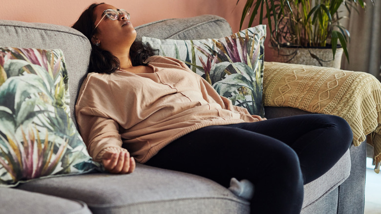 woman waiting on sofa