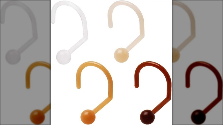 Clear/flesh-colored nose earrings