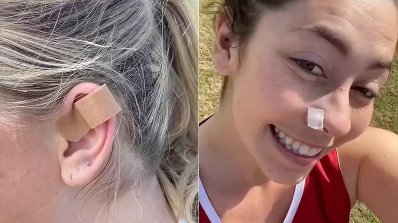 Women hiding piercings with band-aids