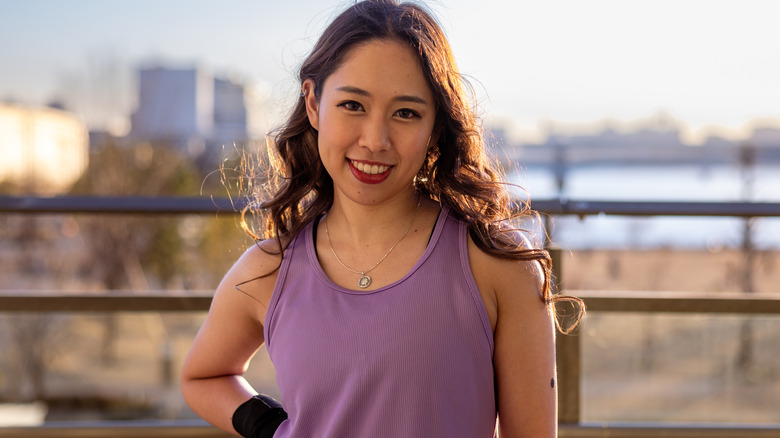 Woman poses in digital lavender tank