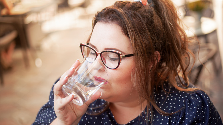 A woman drinking water