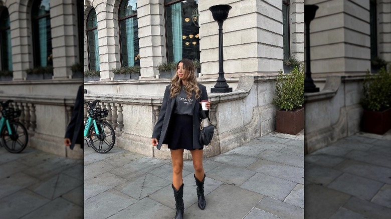 woman wearing blazer and boots