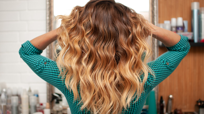 Blonde curly hair.