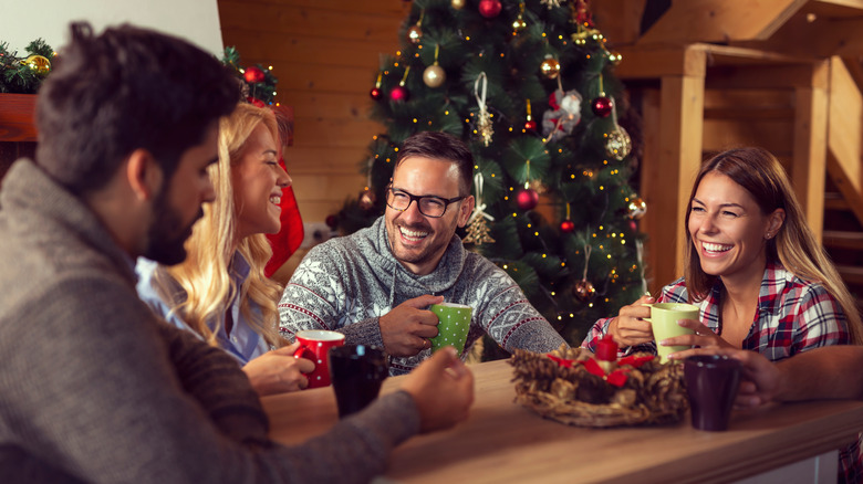 People sitting at table chatting