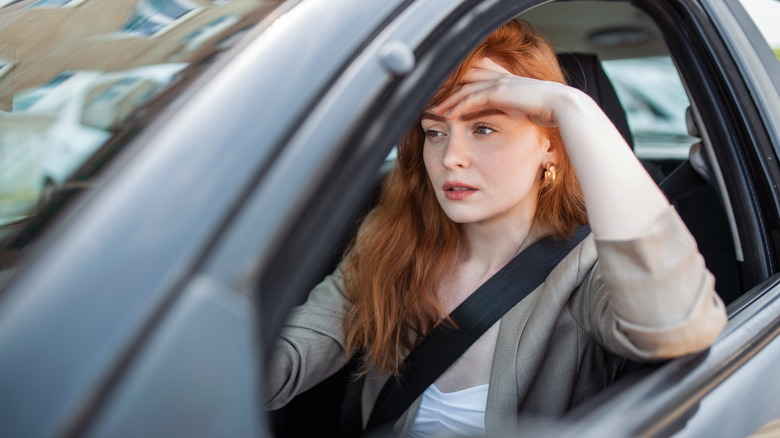 woman in car driving