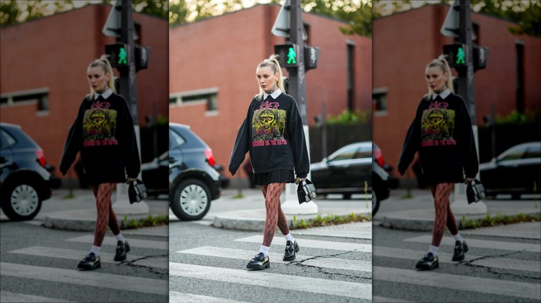 woman wearing graphic sweatshirt
