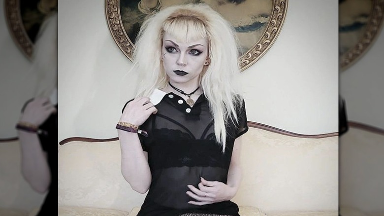 woman on couch posing