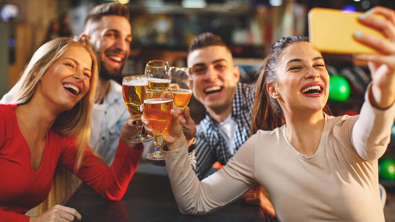 People drinking at a bar
