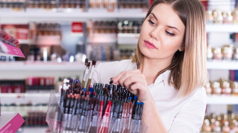 Woman chooses pencil