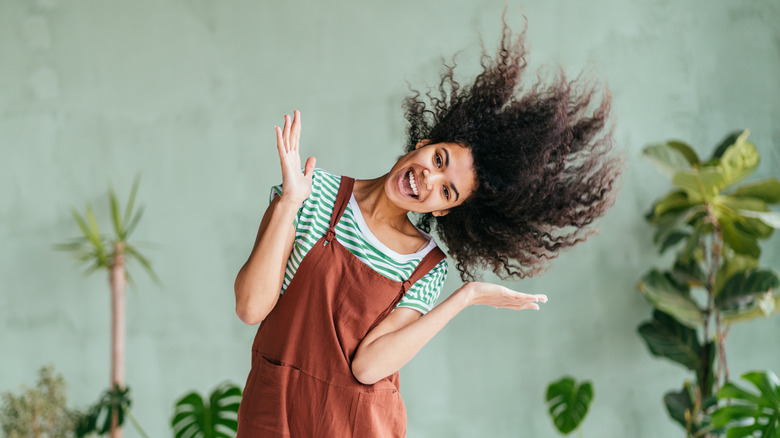 woman shaking her hair
