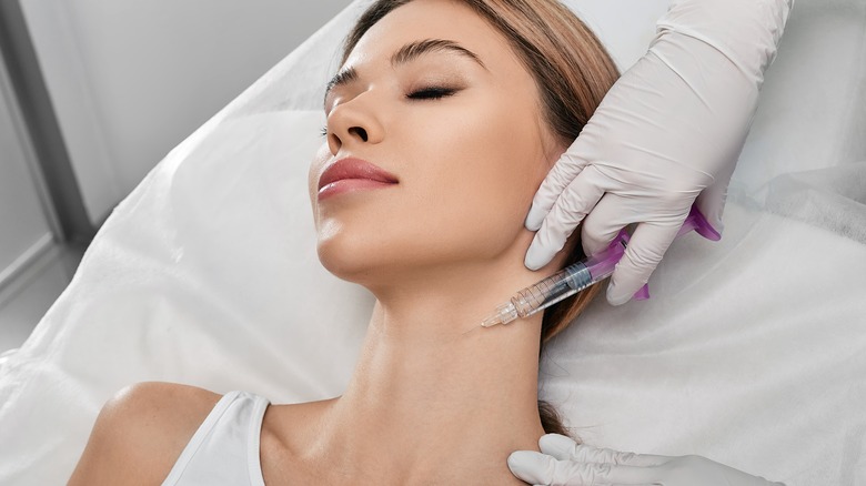 A woman getting a cosmetic treatment 