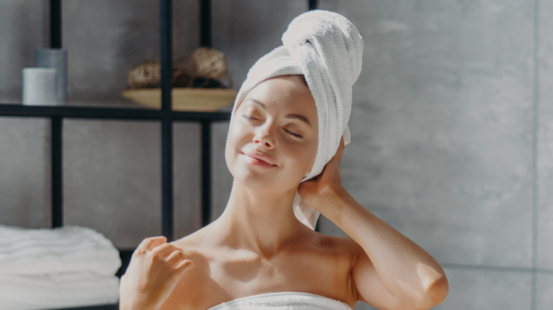 woman with towel on her hair 