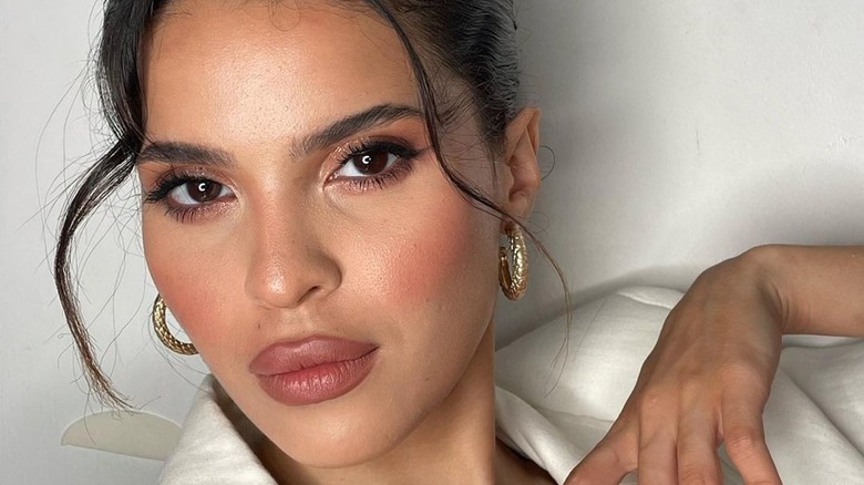 A woman with nude makeup