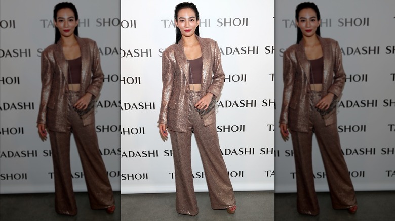 woman in muted sequin suit