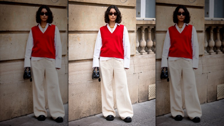 person in sweater vest