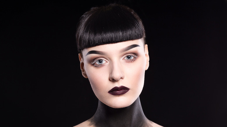 person with white eyelashes