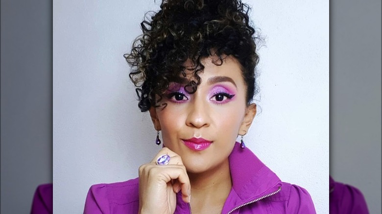 person with purple eyeshadow