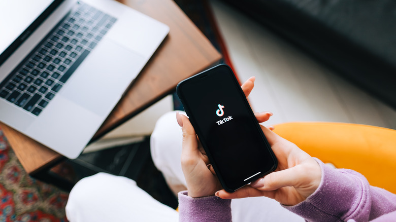 person opening tiktok on phone