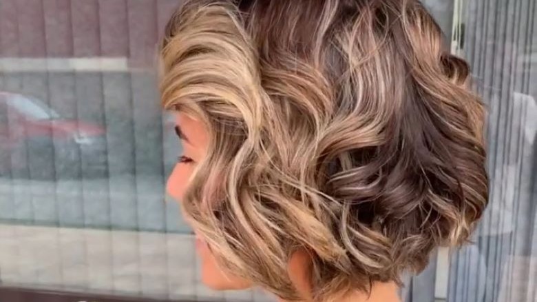 Woman curly wedge haircut
