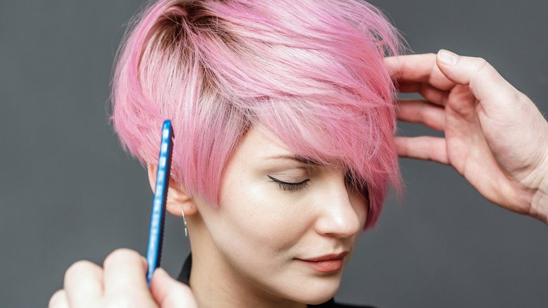 Woman with short pink hair
