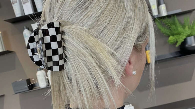 Woman with hair in claw clip 