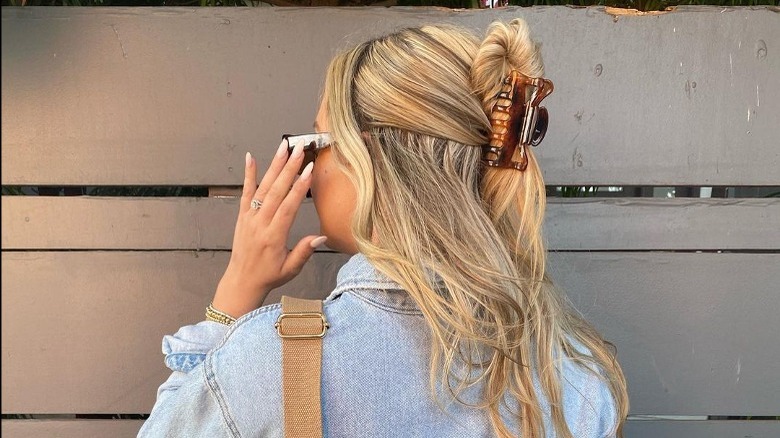 Girl wearing a half-up, half-down twist