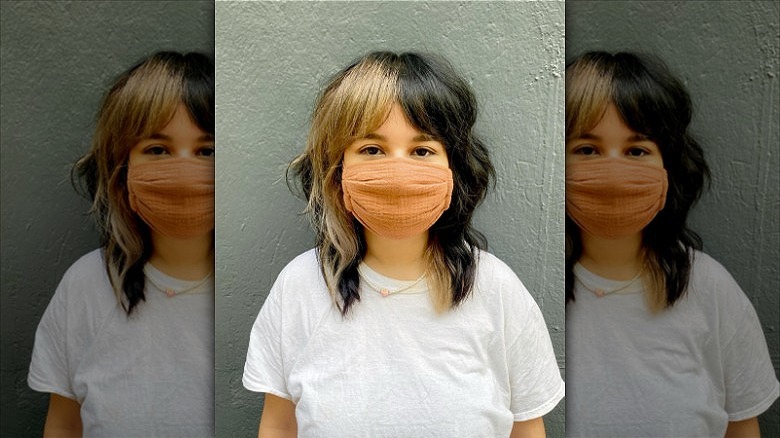 woman with two-toned curtain bangs