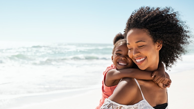 Mother and daughter on beach