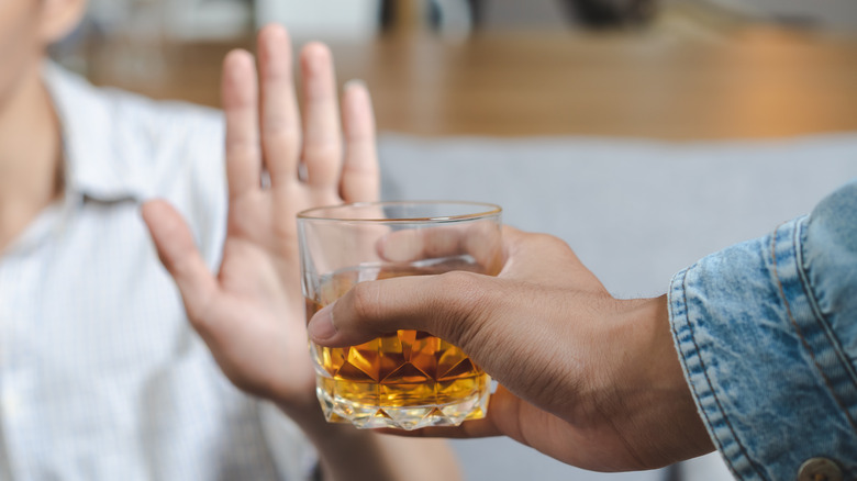 Person rejecting alcohol