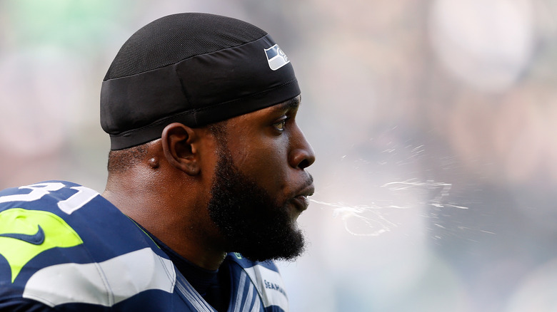 football player spiting