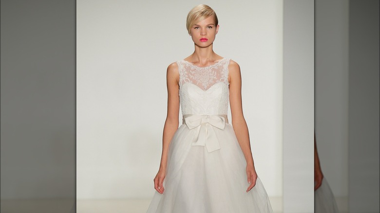 Bridal model with blond pixie cut