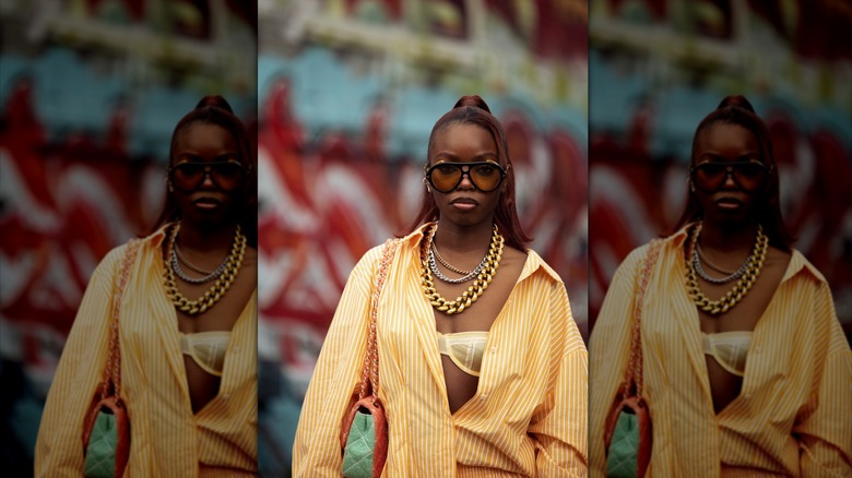 Girl wearing statement necklaces
