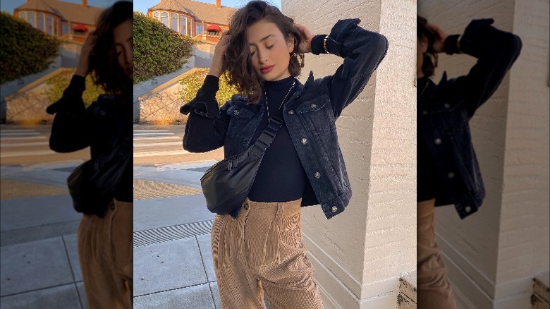 Girl mixing in black denim with corduroy.