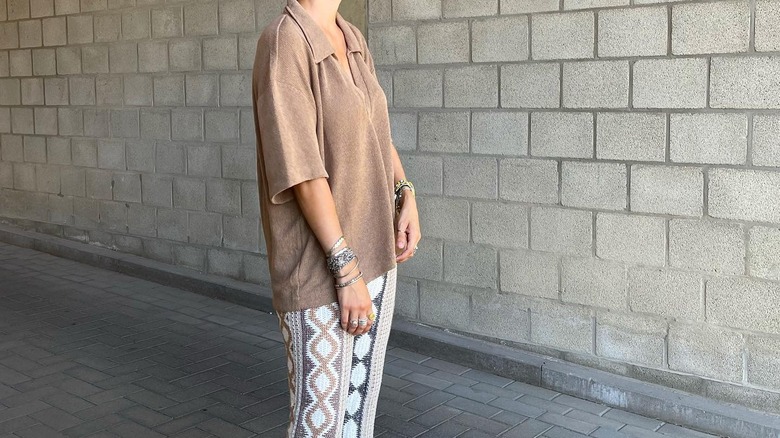 brown polo shirt with crochet pants