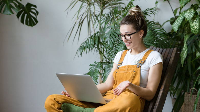 Woman video chatting on laptop