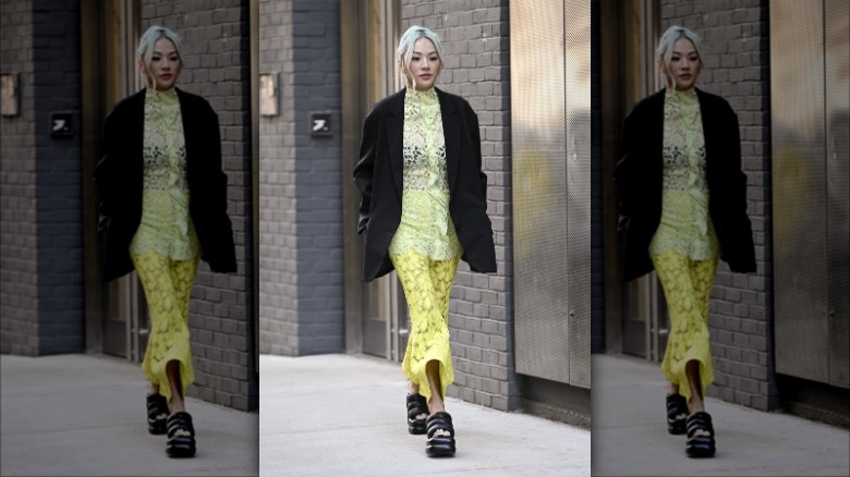 Tina Leung wearing yellow outfit