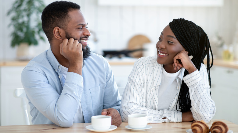 couple happy talking over breakfast