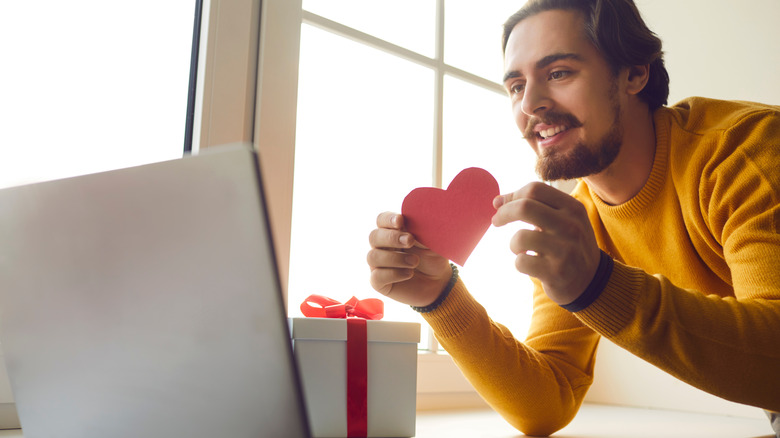 Man being romantic on video call
