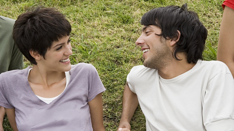 two people smiling