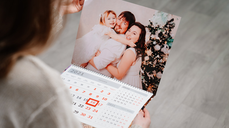 woman looking at calendar