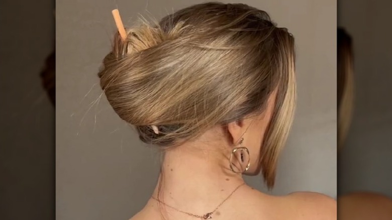 pencil twist in woman's hair